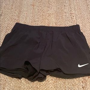 Nike black shorts with spandex detail